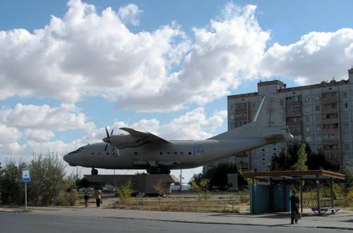 Baikonur Kazakhstan city An-12 airplane monument photo